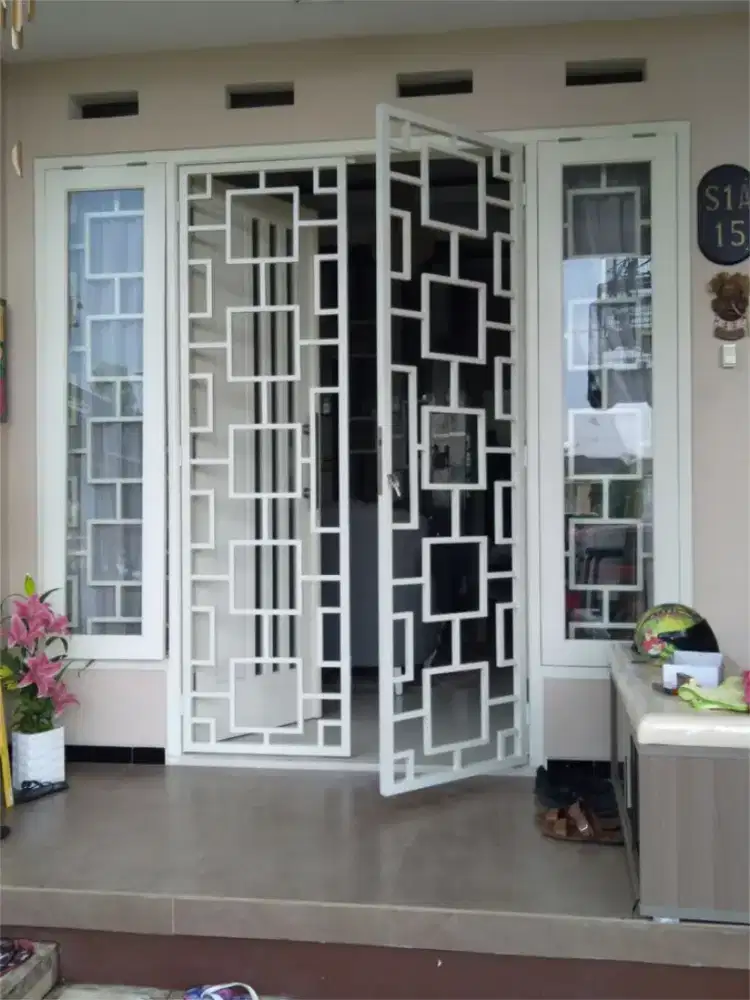 tralis pintu modern anti karat