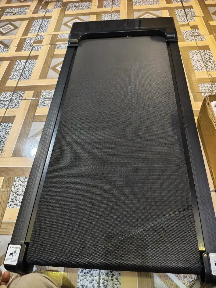 Tredmil elektrik ada remotnya