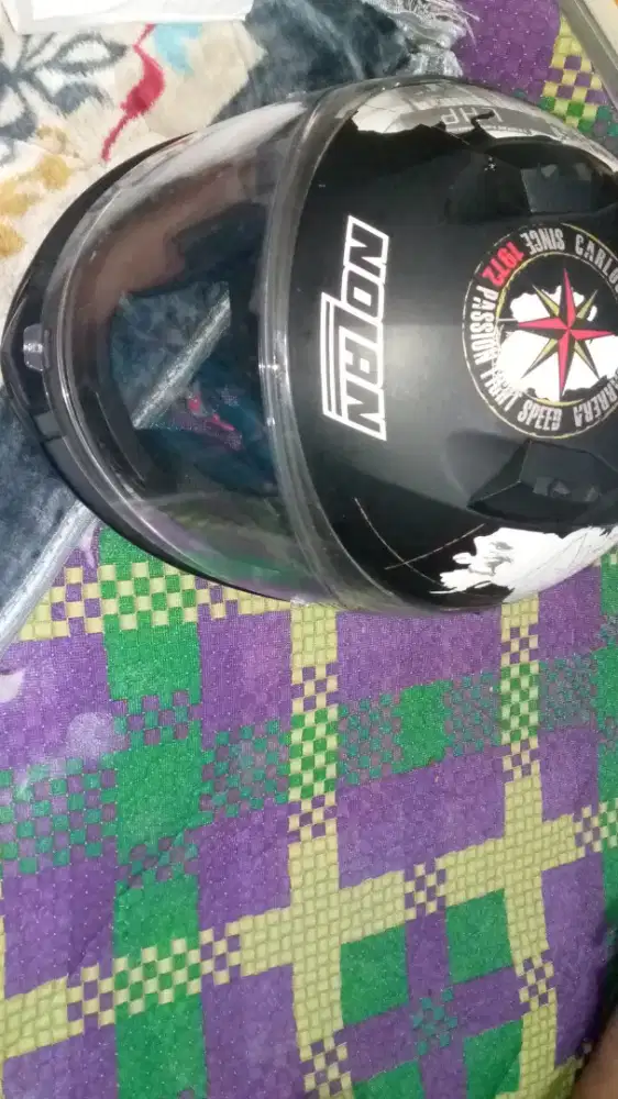 Nolan Carlos checa carrera