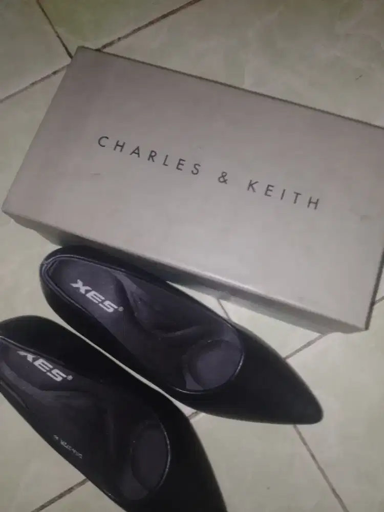 Charles & Keith Hak Tinggi