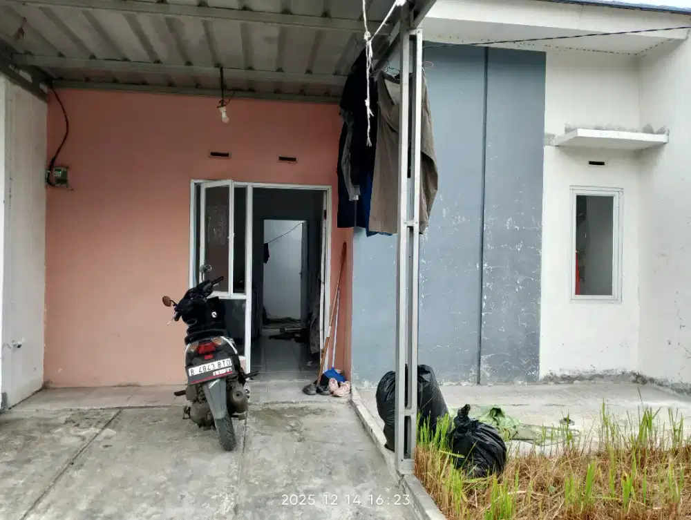 Over kredit perumahan taman kertamukti residen