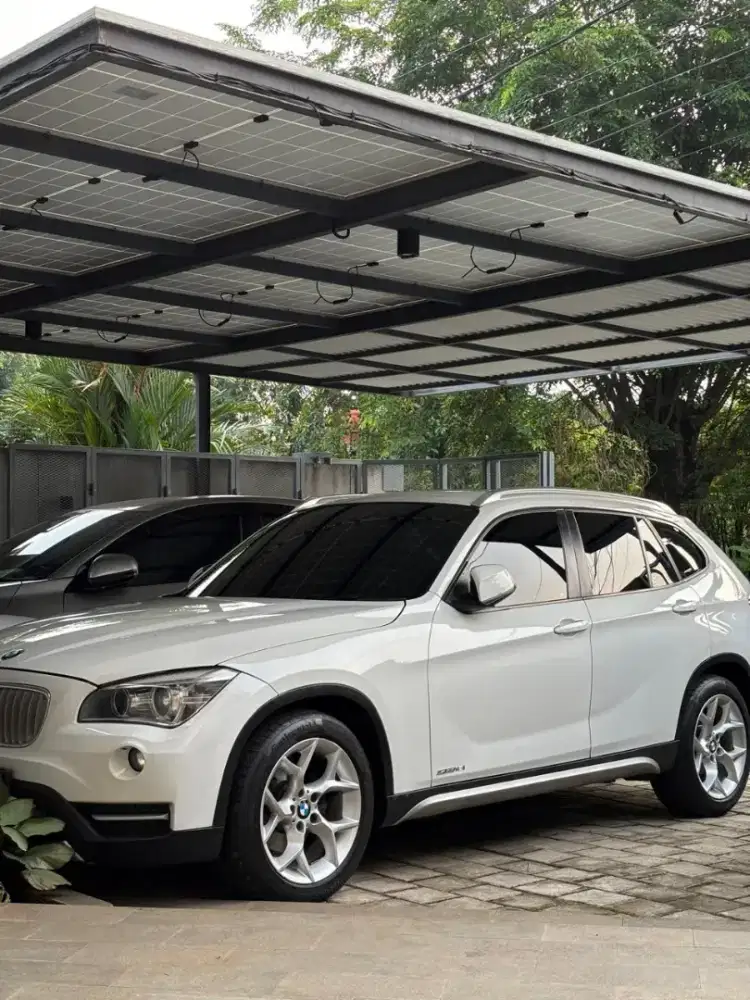 Jual Mobil BMW X1 facelift 2013 putih KM 80rb