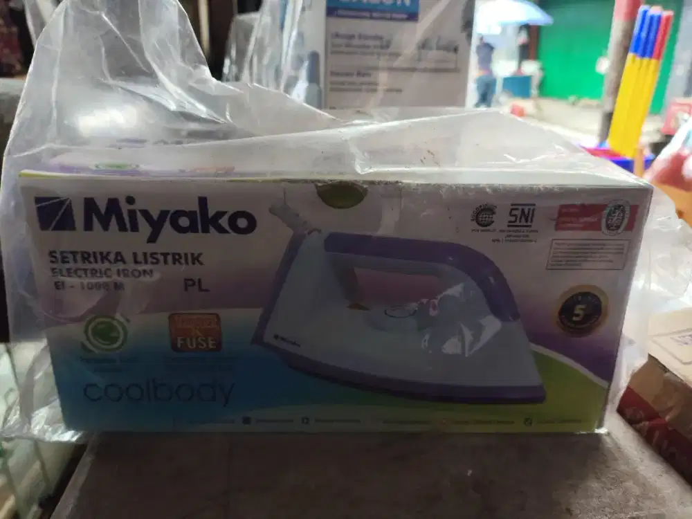 Setrika miyako  berwarna ungu