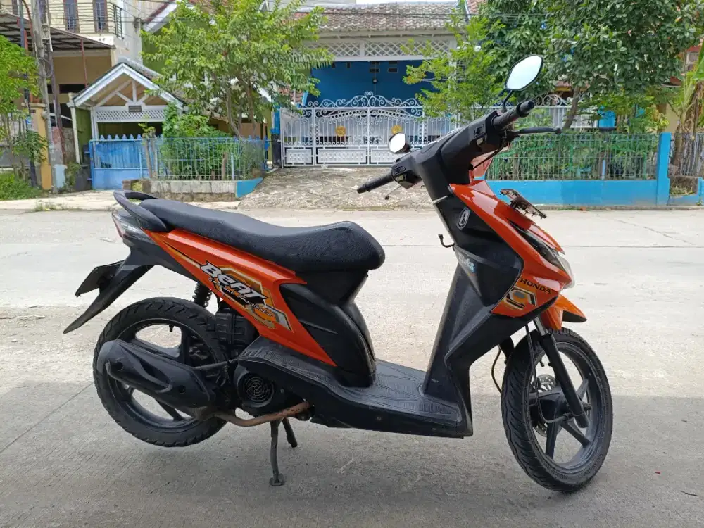 Honda beat  warna body Oranye warna surat Oranye - pajak panjaang