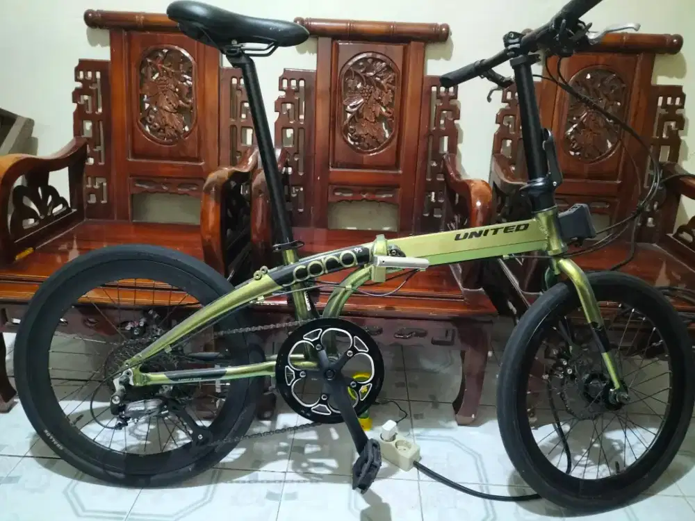 sepeda lipat United cora 9s