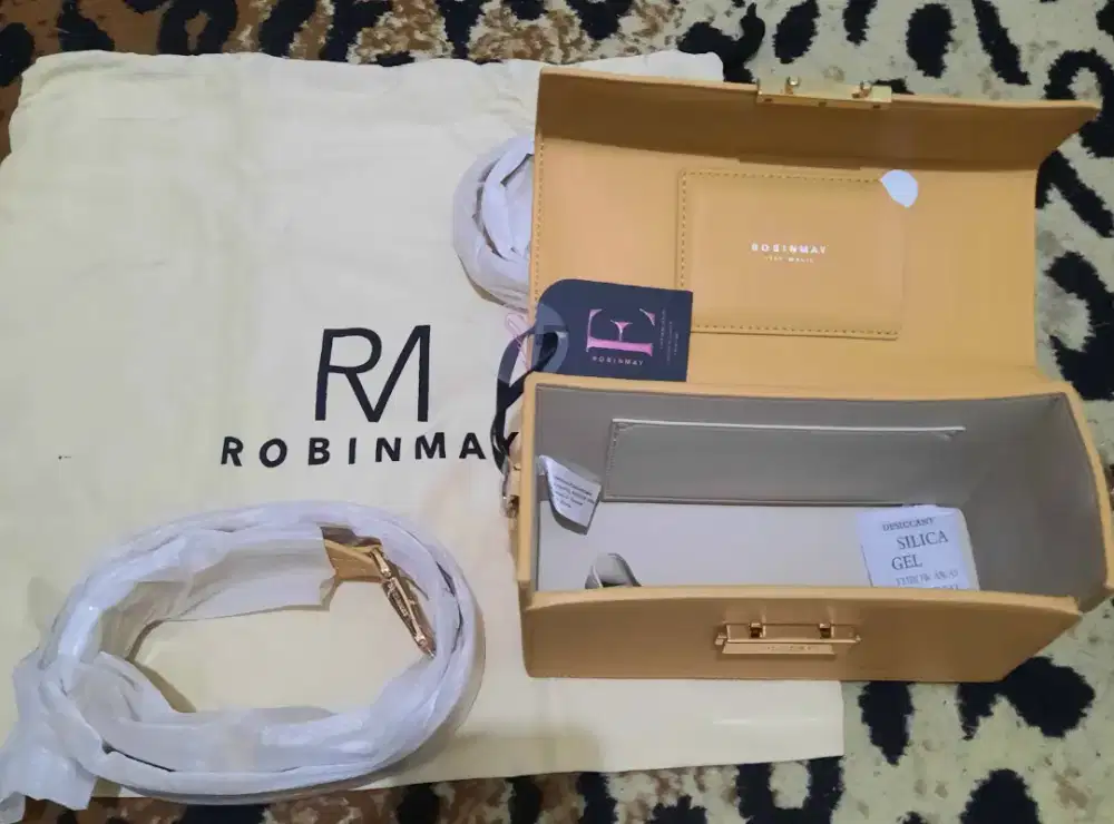 Tas branded robin may