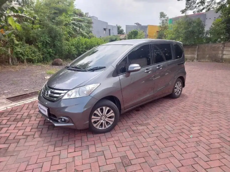 DP MURAH Freed 1.5 E Bensin Matic 2014 ABU-ABU CM