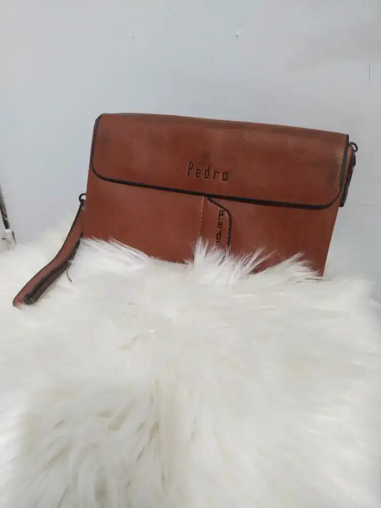 Clutch pria Pedro