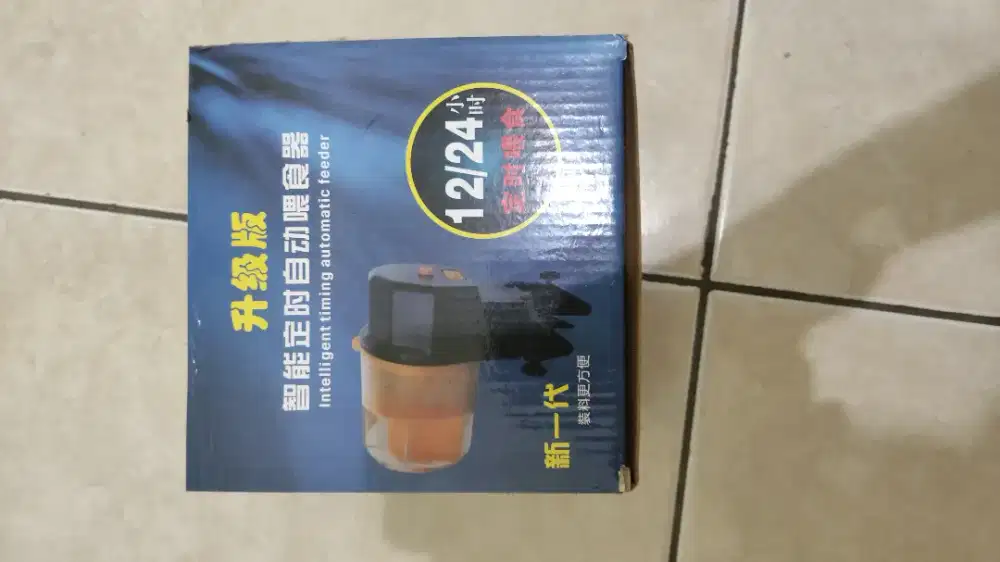 feeding makanan ikan otomatis