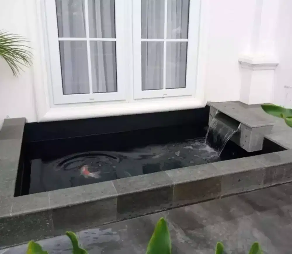 Pembuatan kolam koi minimalis.