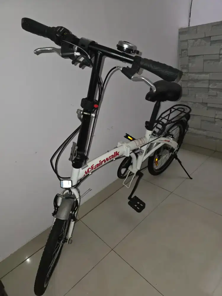 Sepeda lipat bisa di bawa masuk mobil