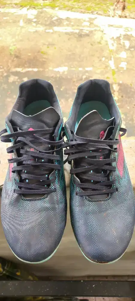 Sepatu bola mils xenon