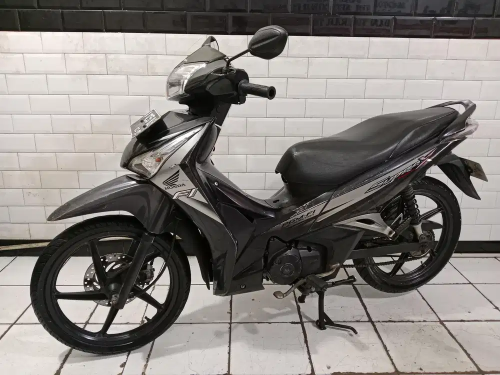Honda supra helm in tahun 2012 tinggal pakai