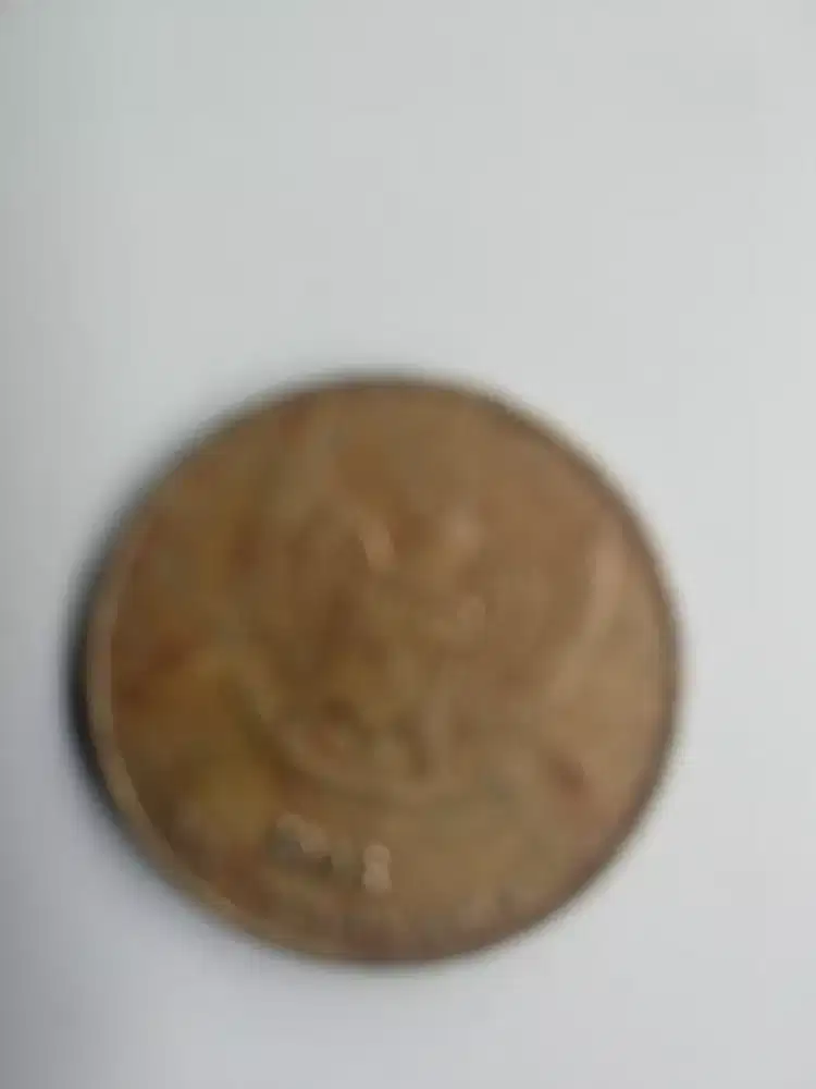 Uang koin 50 rupiah kuning