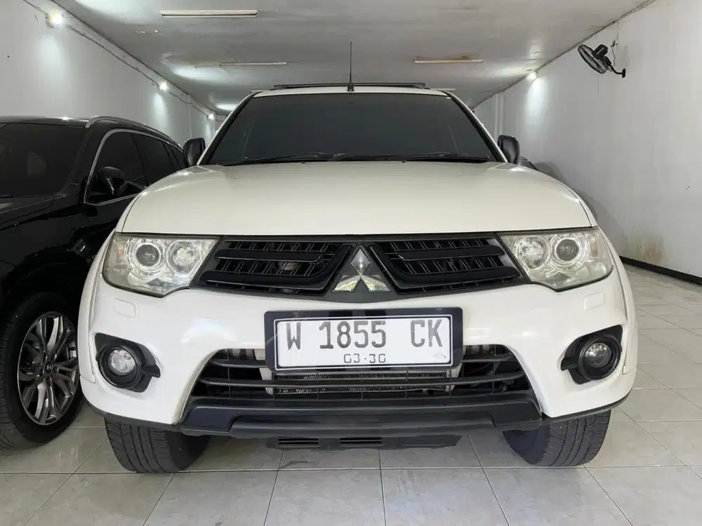 MITSUBISHI PAJERO SPORT 2.5 DAKAR 4x2 2014 MATIC LOW KM 100rb DP MINIM