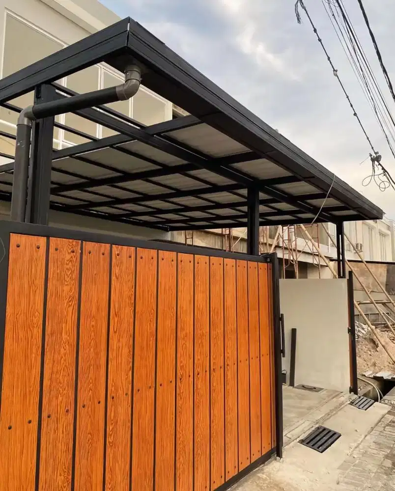 Kanopi alderon kombinasi atap solarflat rangka besi hollow
