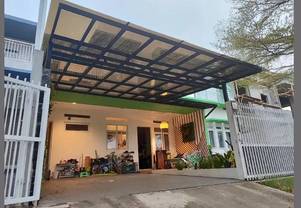 Kanopi atap solarflat rangka hollow galvanis