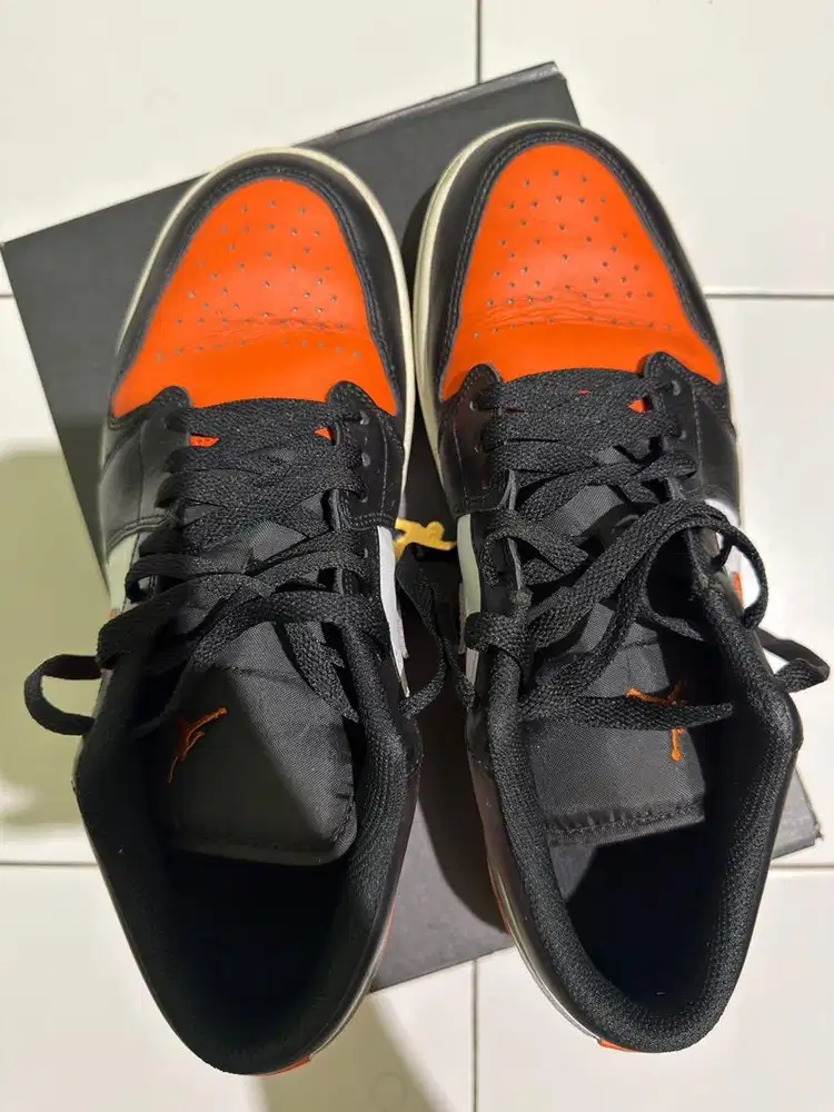 SEPATU NIKE AIR JORDAN 1 LOW BLACK/STARFISH-WHITE-SAIL