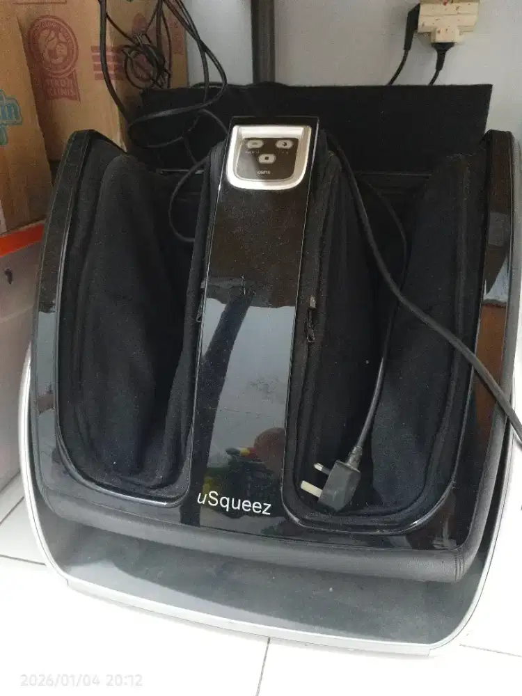 Alat pijat kaki Usqueez