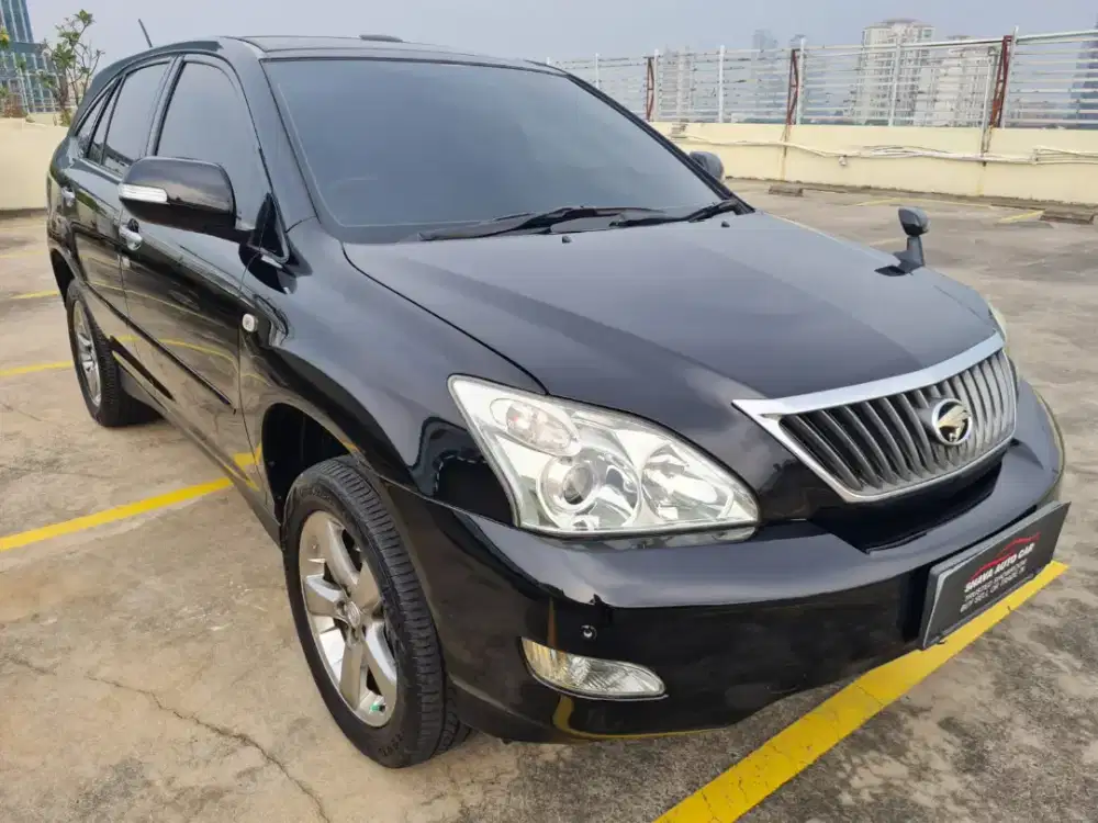 Harrier L Premium 2012 Nik 2011 kondisi full original.