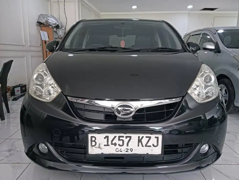 Daihatsu sirion matic DP 5jt tahun 2014