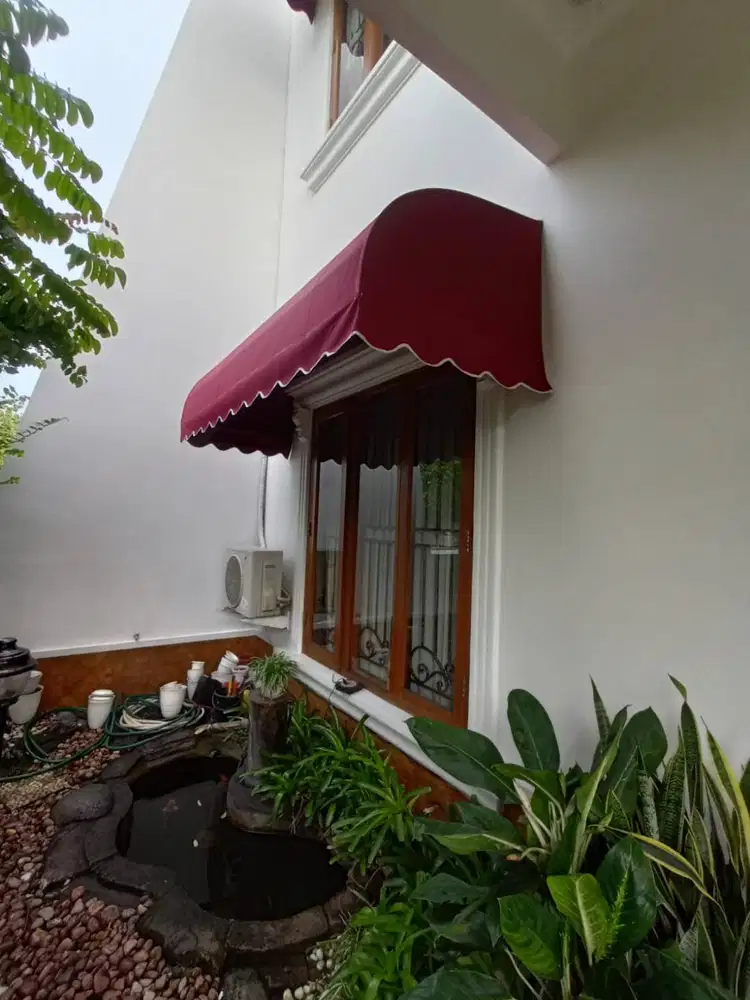 kanopi kain awnng warna merah elegan di pasang dengan rangka