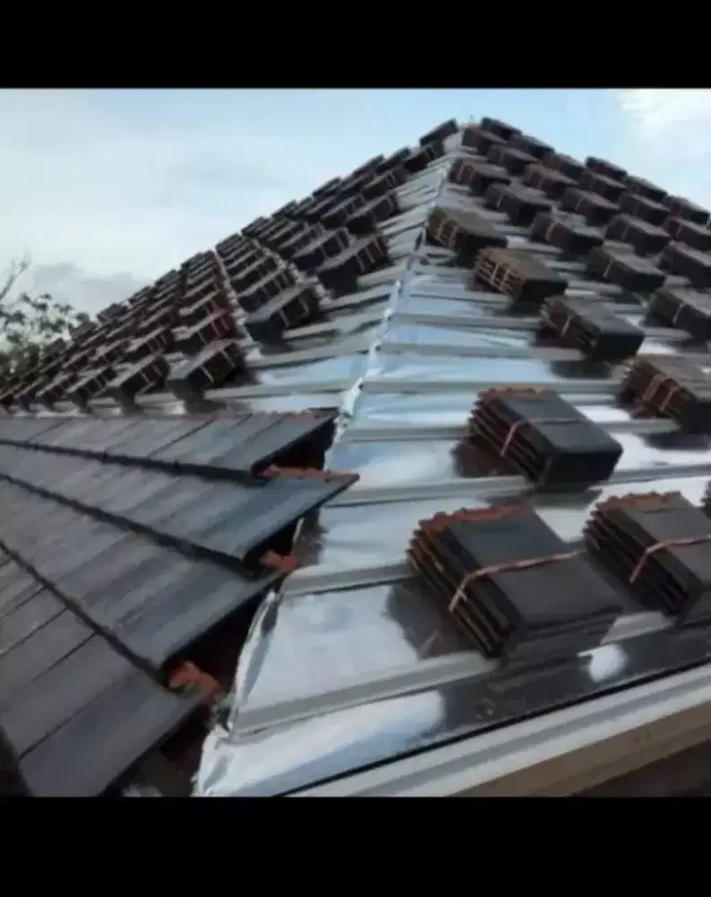 Bongkar pasang atap rumah