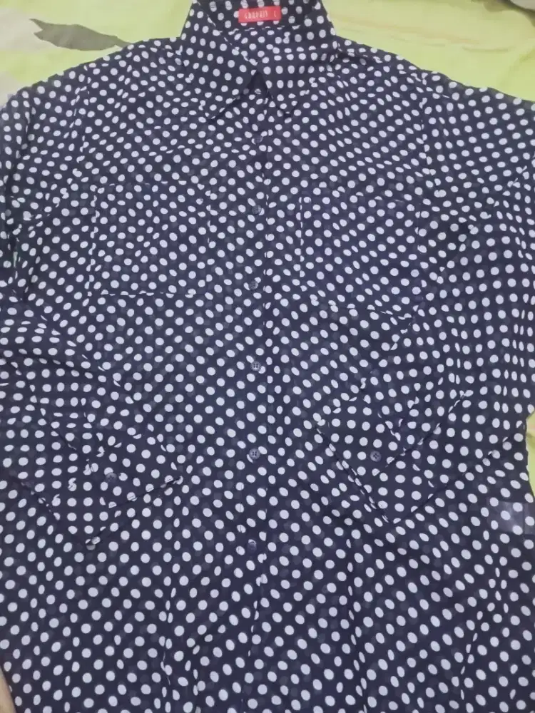 Atasan polkadot brand Graphis