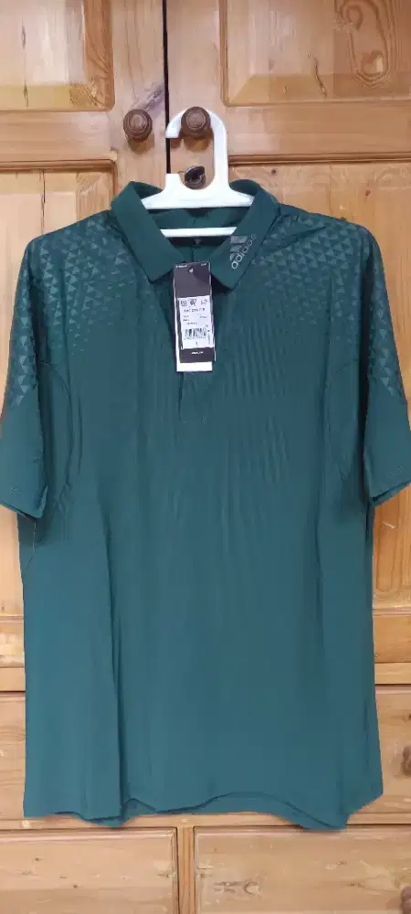 kaus Adidas Originals One Ctn Jer T berwarna hijau.