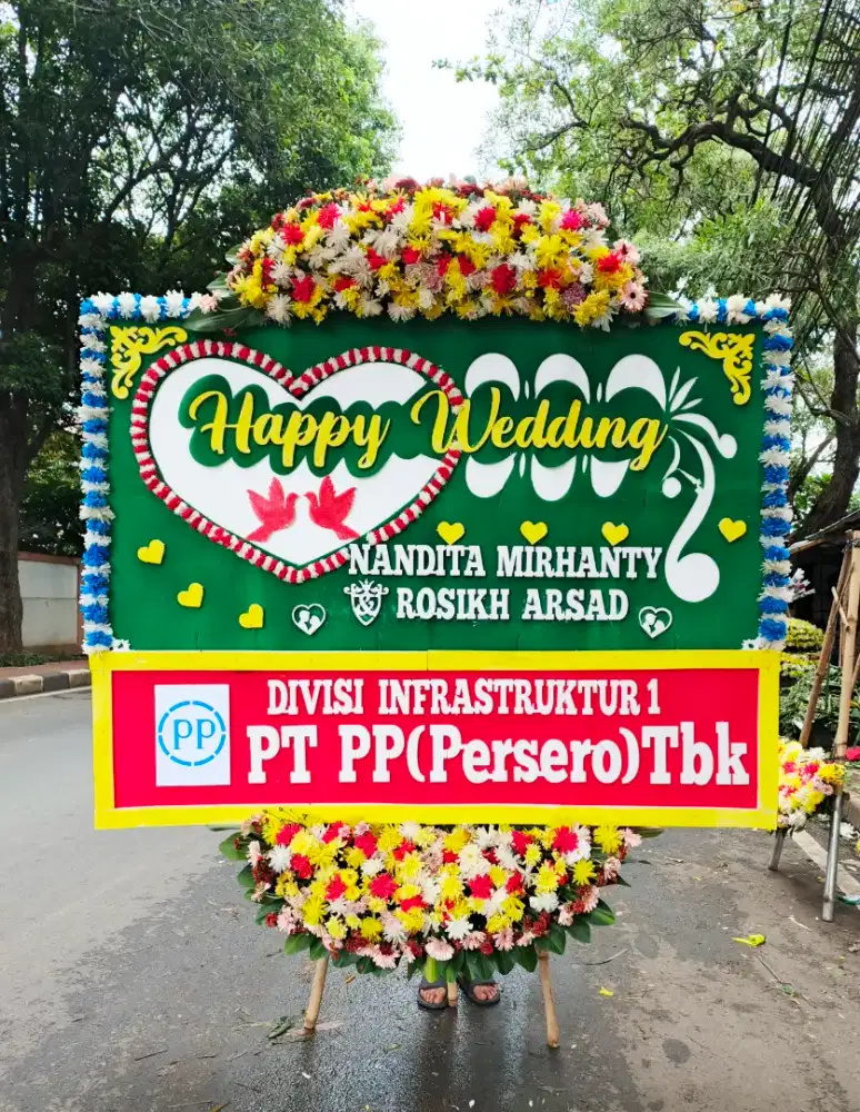 Karangan ucapan bunga papan