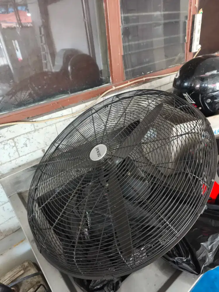 Menjual barang bekas kipas angin