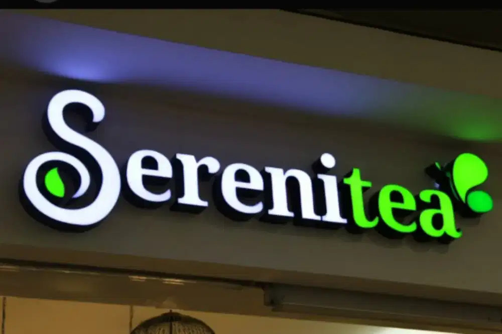 Huruf timbul dan logo