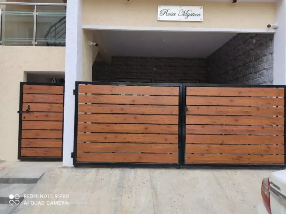 Pagar rumah kayu lisplang