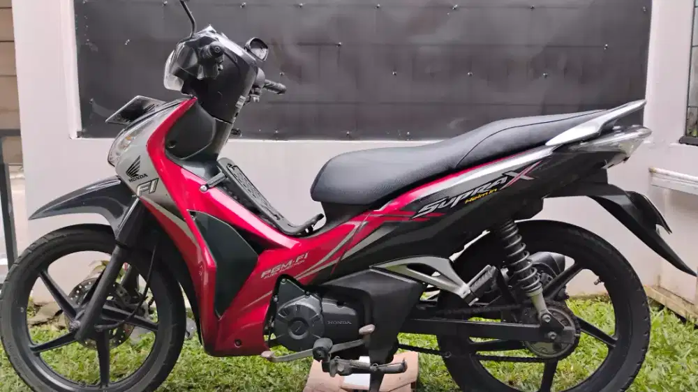 SUPRA X HELM IN PGM FI FUEL INJECTION TAHUN 2013