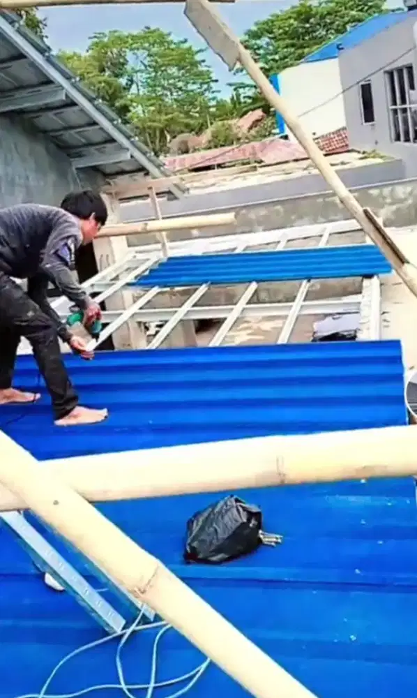 TukanG Atap Rmh Yg BocoR.talNg air