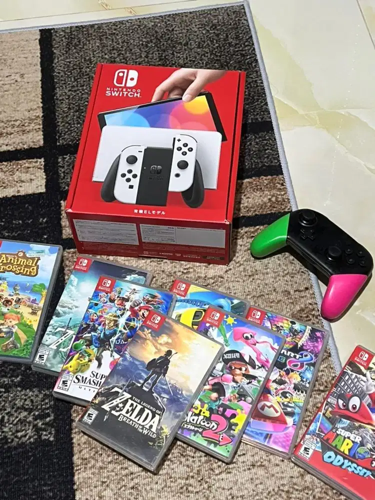 NINTENDO SWITCH OLED FREE GAMES AND PRO CONTROLLER