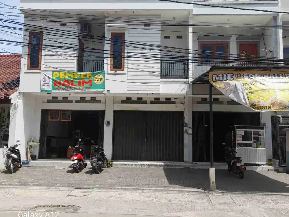 Disewa ruko dengan area bebas banjir di jalan Dahlia Indah Raya Harapan Indah 1