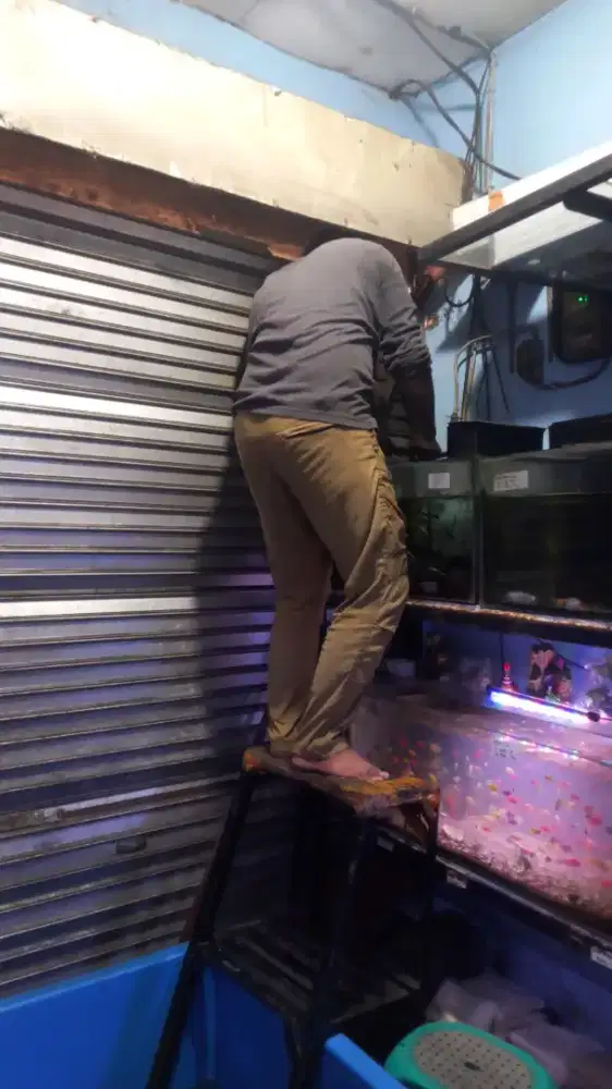 Tukang reparasi rolling door folding gate murah