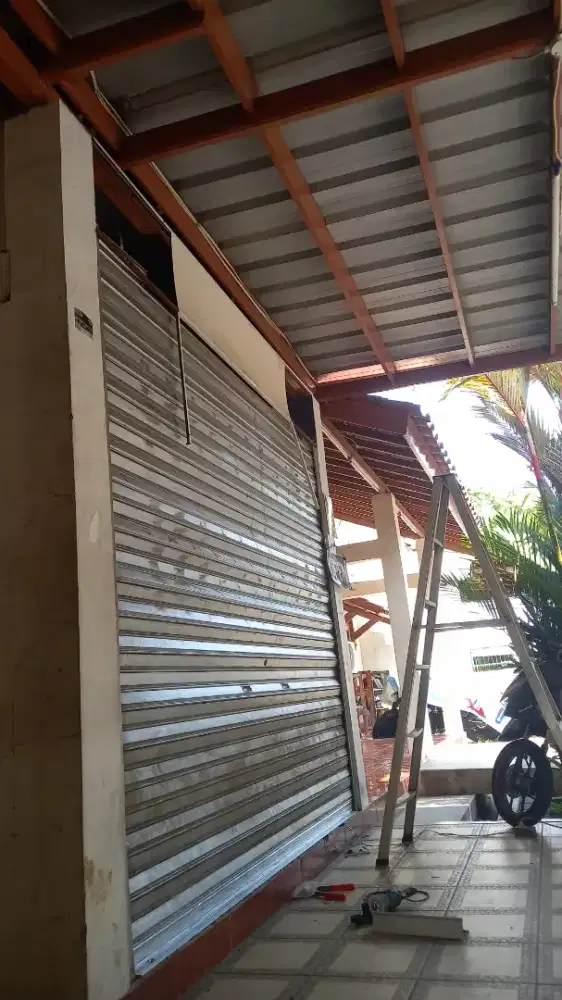Tukang reparasi service rolling door folding gate