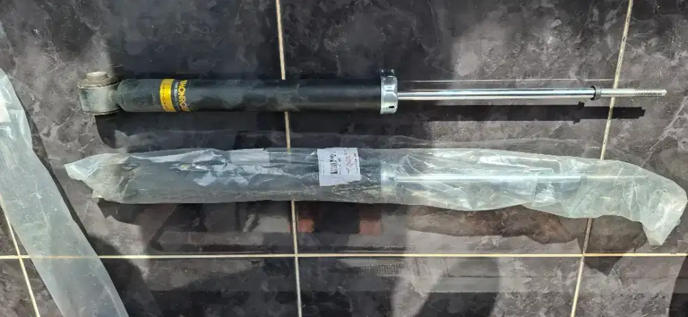 Original set shock absorber xpander monroe spectrum