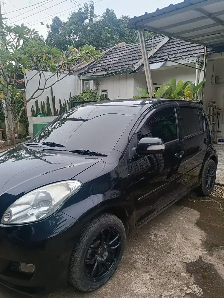 Daihatsu Sirion 2010 Bensin