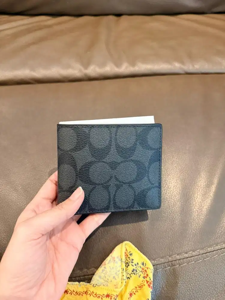 Slim billfold wallet in signature coach