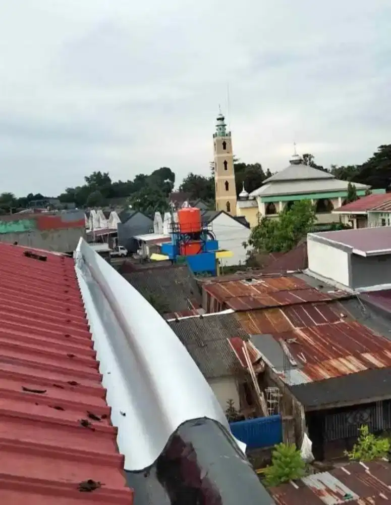 TukanG atap BocoR.talNg air