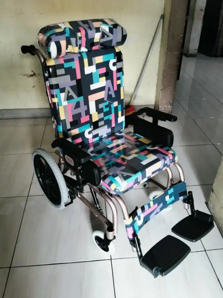 Kursi roda cerebral palsy