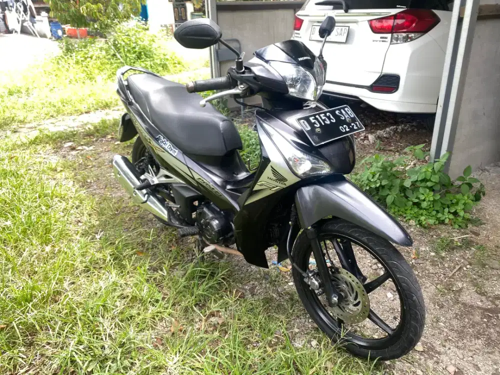 Honda Supra x 125 2012 helm in
