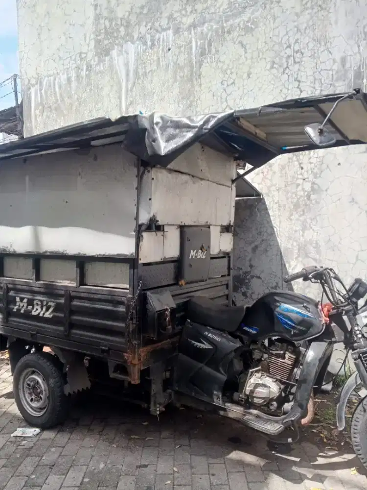 Motor roda tiga (tossa)