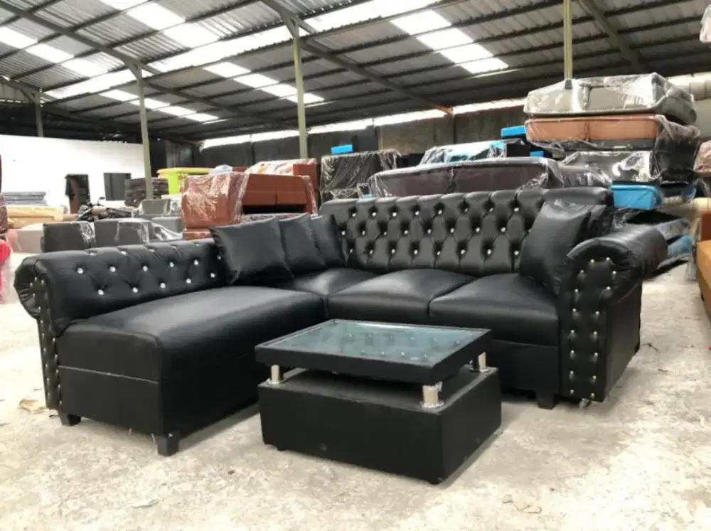 Sofa tamu model L kancing full kulit
