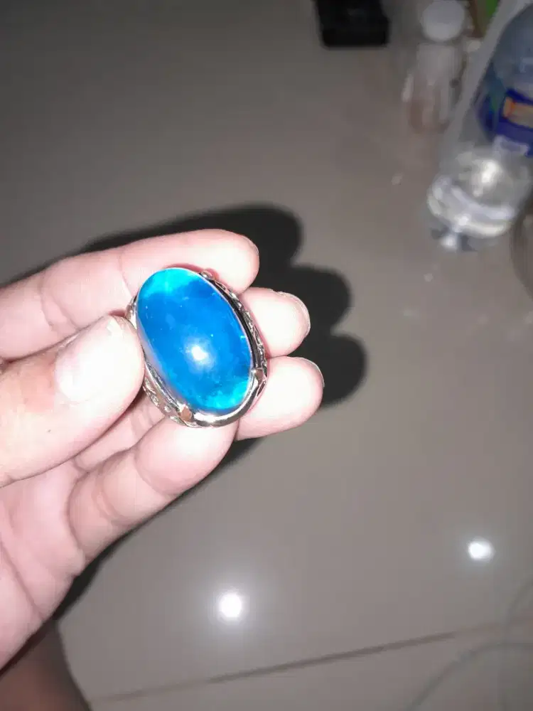 Blue topas dengan ring model kerawang