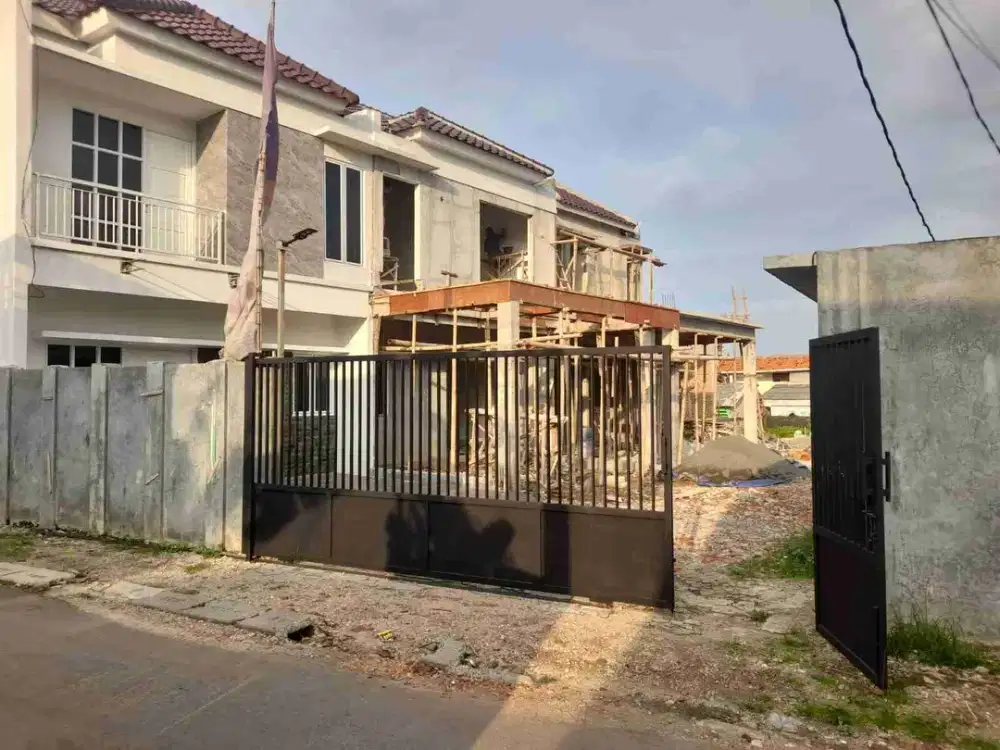 Rumah dalam cluster mewah dinding ful batamerah dijatibening lokasi strategis dekat stasiun LRT Jatibening