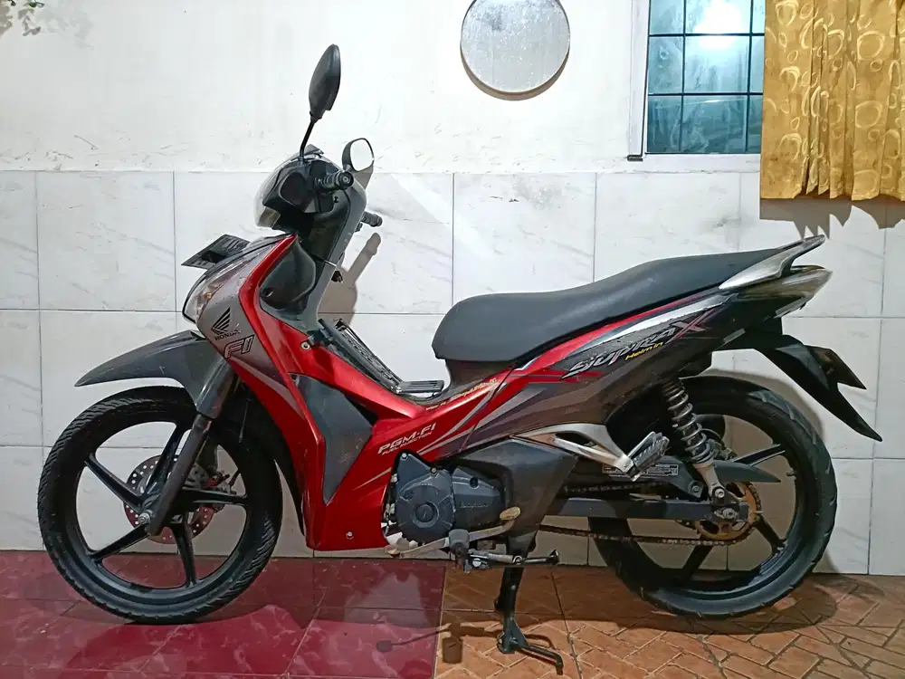 Supra x 125 helm in tahun 2013/tt boleh gan cash lebih bagus